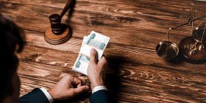 how are wrongful death settlements paid out